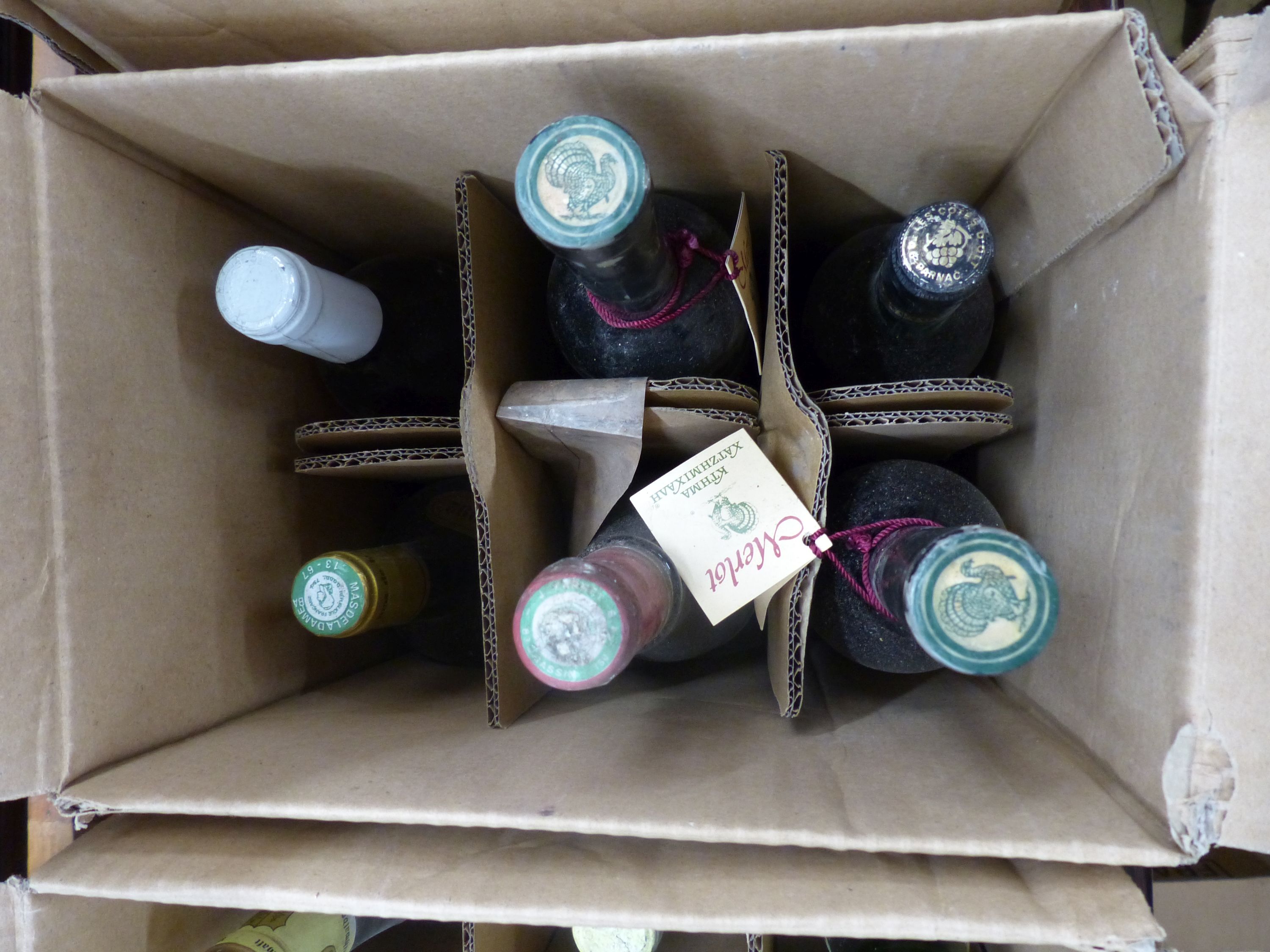 Approximately 74 bottles of assorted wines and spirits including Cahors 1978, Chateau du Cricastin 1979, etc.